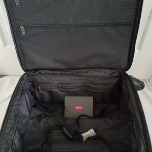 JUST LIKE NEW Tumi carry-on...used 1 time only.